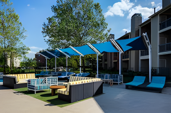 Outdoor patio area with lawn furniture